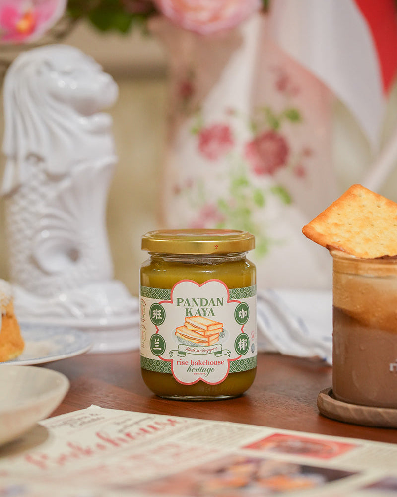 Jar of Pandan Kaya on a table with a blurred background